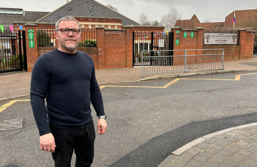 Will outside Holly Trees Primary School